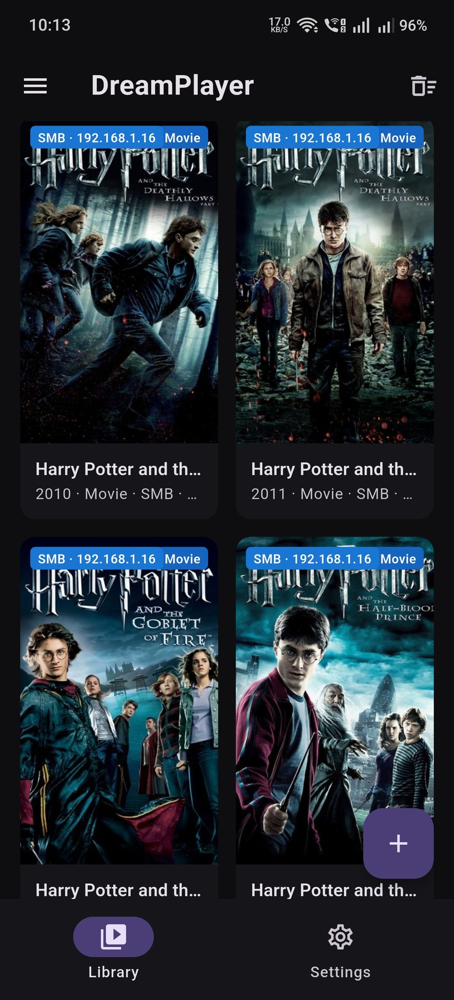 Android library showing films pulled from an SMB share, with source and year badges